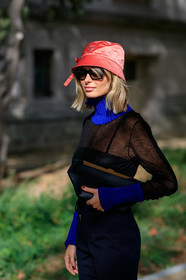 xenia adonts, prada hat, red hat, black top, sheer top, blue pullover, blue top, high collar top, turtleneck top, turtleneck pullover, black leather clutch, black pants, PARIS, PFW, SPRING SUMMER 2020, SS 20, fashion week, frenchystyle, FW, jonathan paciullo, street style, vertical, atmosphere details, detail