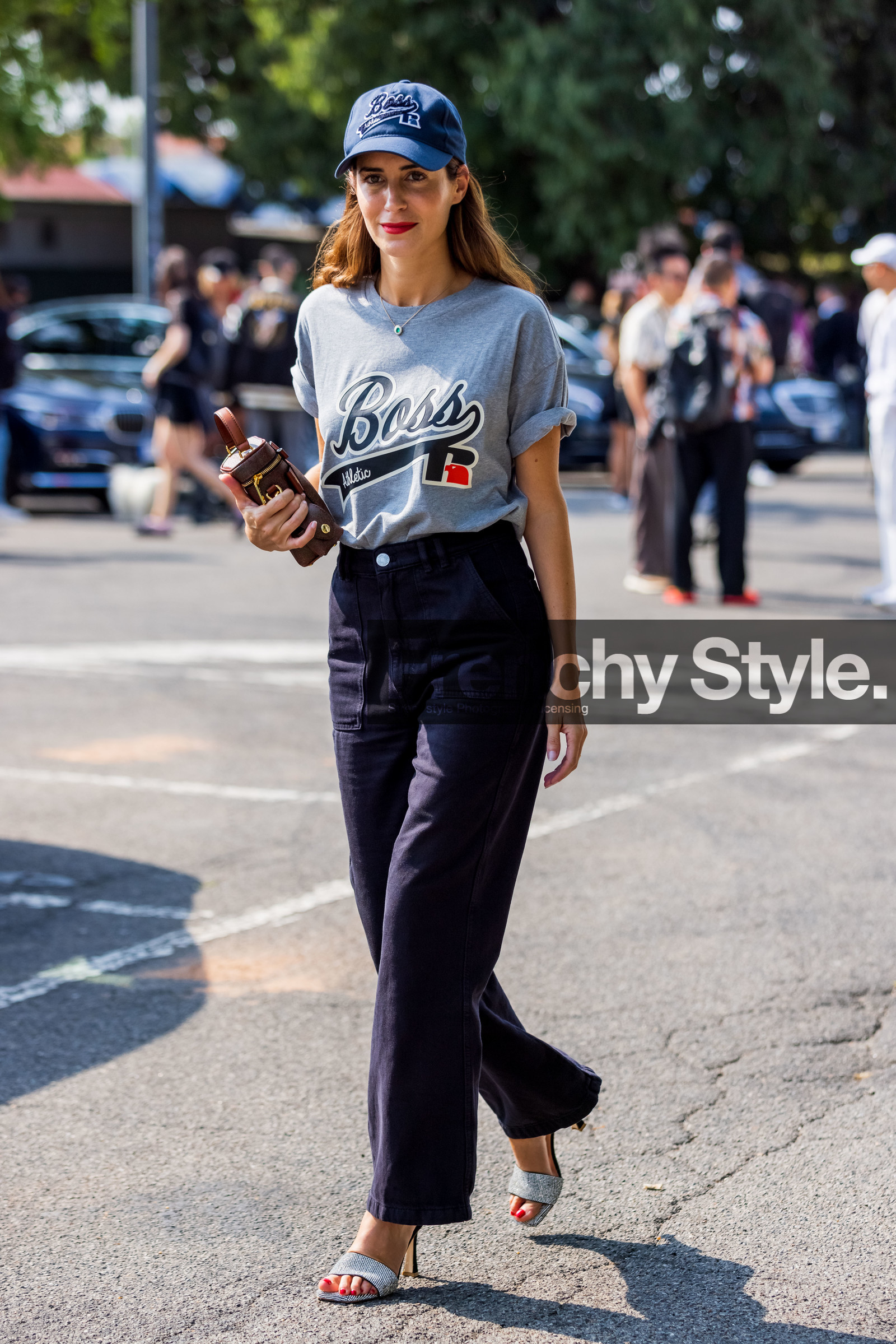 blue cap, blue pants, boss cap, boss t-shirt, cap, Gala Gonzalez, grey t-shirt, heels, large pants, louis vuitton bag, open toe, silver shoes, red lips, dark blue pants, fashion week, frenchystyle, FW, jonathan paciullo, street style, MFW, MILAN, SPRING SUMMER 2022, SS 22, vertical, full length