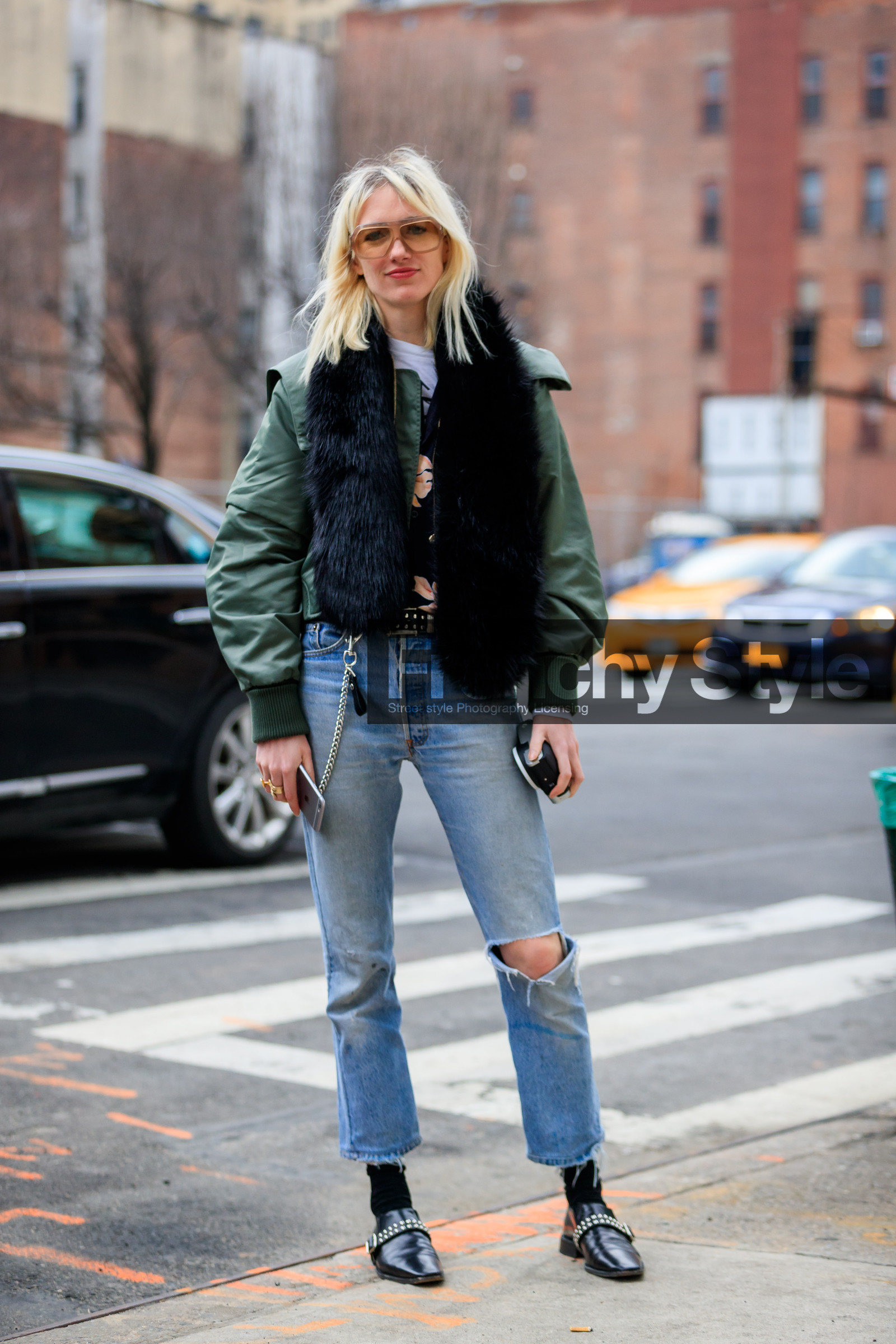 black belt, black scarf, black shoes, blue denim, bomber jacket, chains, denim pants, fur scarf, green jacket, jeans, leather belt, leather shoes, ripped pants, studs, sunglasses, trousers, street style, jonathan paciullo, FW, frenchystyle, fashion week, NYFW, NEW YORK, AUTUMN WINTER 2018-2019, AW 18-19, FALL WINTER 2018-2019, FW 18-19, vertical, full length, phoebe arnold