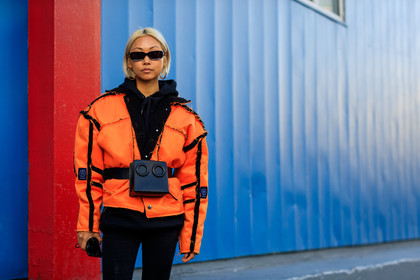 black bag, black belt, black denim, black sweater, denim pants, fanny pack, graphic jacket, hoodie, jeans, leather bag, leather belt, orange jacket, printed jacket, sunglasses, trousers, street style, jonathan paciullo, FW, frenchystyle, fashion week, NYFW, NEW YORK, AUTUMN WINTER 2018-2019, AW 18-19, FALL WINTER 2018-2019, FW 18-19, atmosphere details, horizontal, detail, vanessa hong