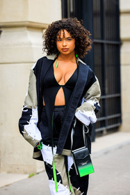 curls, neon green earrings, cut out top, black top, patched jacket, denim jacket, blue and kaki jacket, patched pants, denim pants, crossbody bag, black crossbody bag, neon green bag, paola locatelli, fashion week, frenchystyle, FW, jonathan paciullo, street style, AUTUMN WINTER 2022-2023, FALL WINTER 2022_2023, FW 22-23, PFW, PARIS, vertical, detail