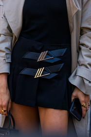 black skirt, Caroline Daur, close up, detail, prada skirt, skirt, pleatde, pleated skirt, mini skirt, fashion week, frenchystyle, FW, jonathan paciullo, street style, MFW, MILAN, SPRING SUMMER 2022, SS 22, vertical, atmosphere details