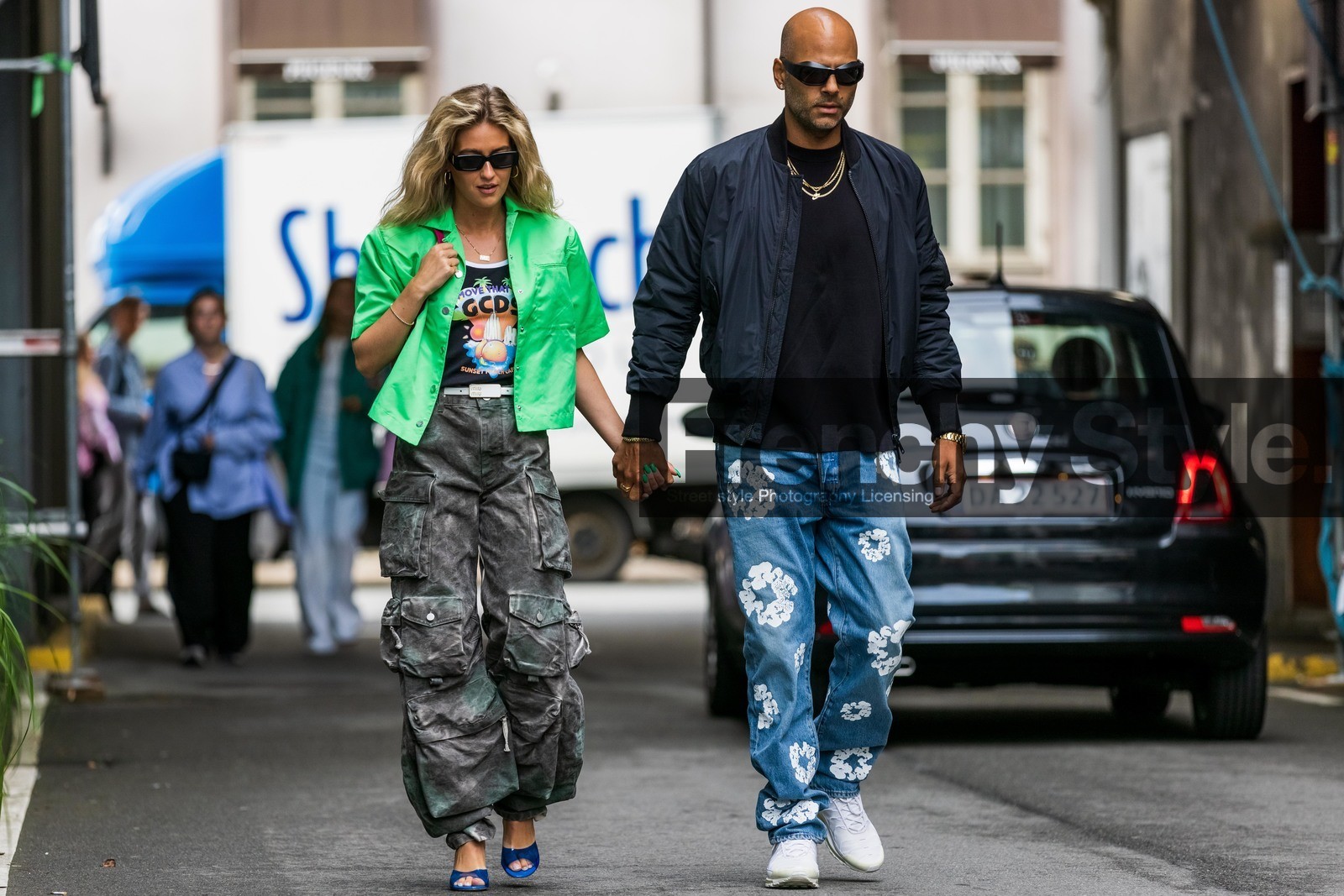 Emili Sindlev, Mads Emil Grove Moller, green shirt, short sleeves shirt, black t-shirt, black bombers, black sunglasses, black jeans, printed t-shirt, cargo pants, square shape glasses, white leather belt, miu miu belt, denim, tie and dye jeans, blue jeans, multi pocket jeans, fashion week, frenchystyle, FW, jonathan paciullo, street style, SPRING SUMMER 2022, SS 22, COPENHAGEN, CPHFW, atmosphere details, horizontal, full length