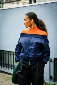 bomber jacket, golden stud earrings, orange turtleneck, black trousers, dark blue jacket, coperni, tina kunakey, street style, jonathan paciullo, FW, frenchystyle, fashion week, AUTUMN WINTER 2022-2023, FALL WINTER 2022_2023, FW 22-23, PFW, PARIS, vertical, detail