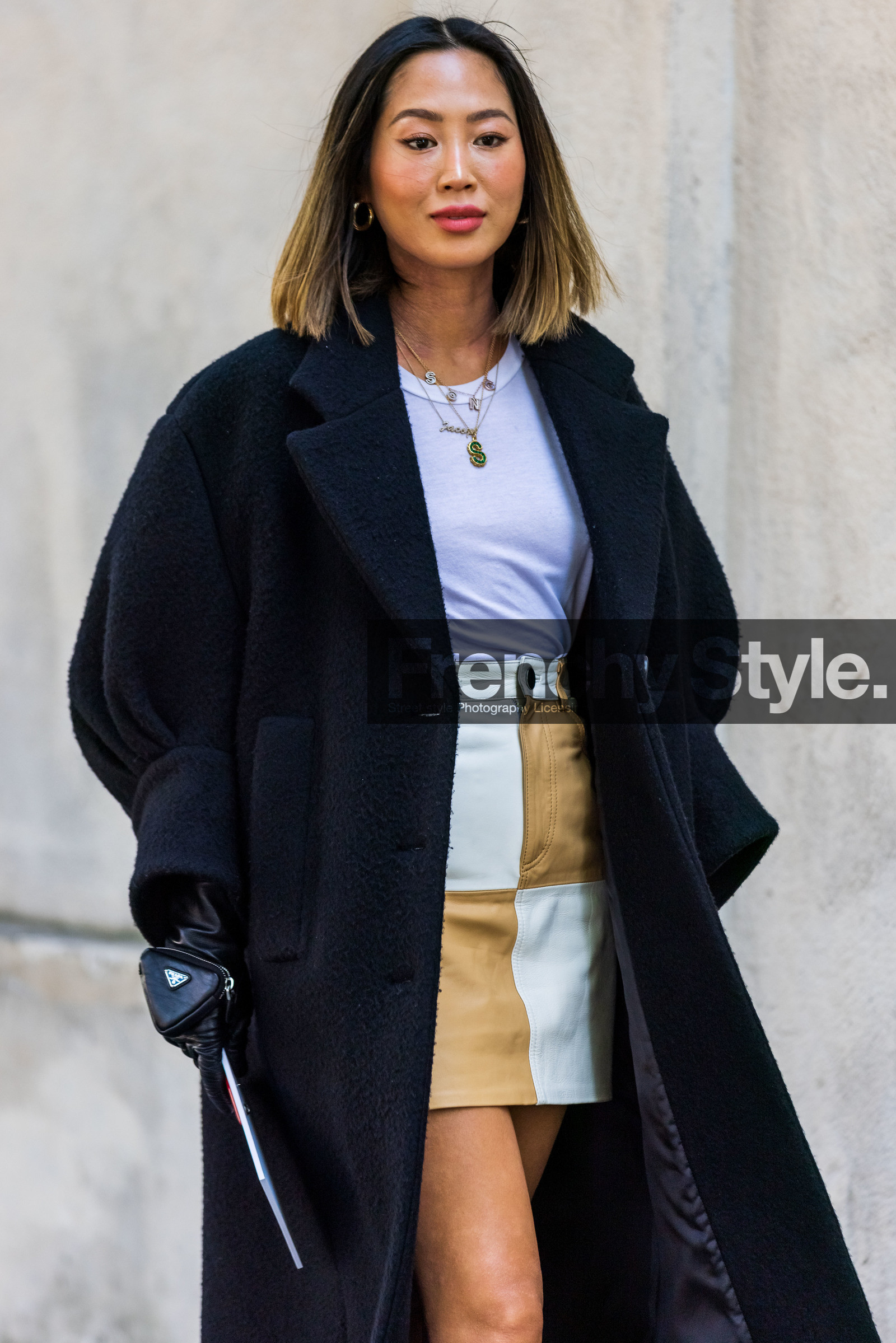 Aimee Song, beige skirt, bicolor skirt, black coat, leather skirt, necklace, oversize coat, patchwork skirt, prada glooves, skirt, white skirt, white t-shirt, wool coat, fashion week, frenchystyle, FW, jonathan paciullo, street style, SPRING SUMMER 2022, SS 22, MFW, MILAN, vertical, atmosphere details