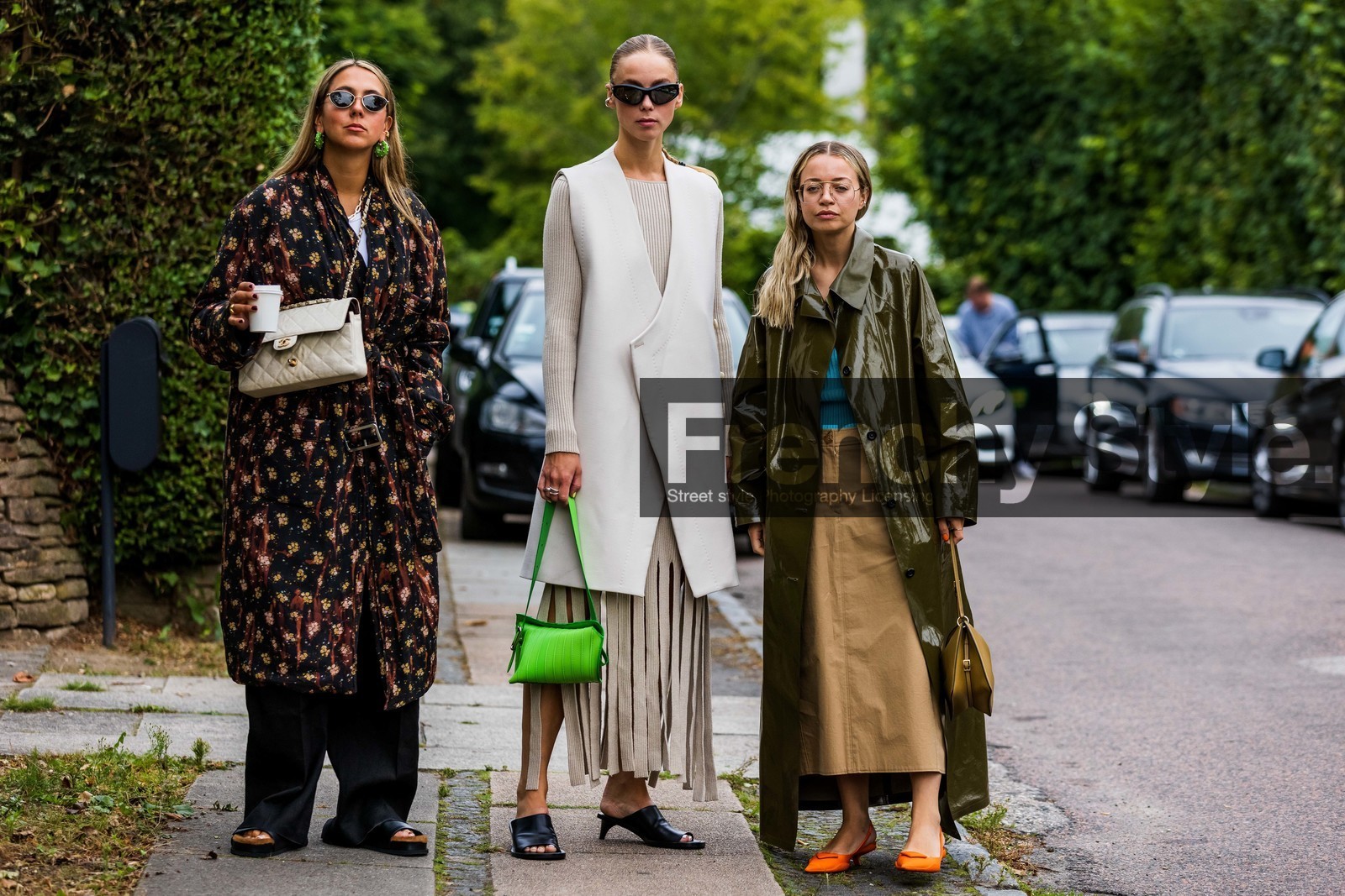 bag, beige dress, beige jacket, beige skirt, black pants, black sandals, blue top, chanel bag, crossbody bag, earrings, flower, flower print, fluid pants, fluo green, fluo green bag, fringes dress, fringes skirt, glasses, green earrings, khaki bag, khaki trench, leather bag, long coat, long skirt, long trench, pants, patent trench, prada heels, print, printed coat, quilted bag, ribbed dress, sandals, silver sunglasses, skirt, sleveless jacket, sunglasses, trenchcoat, white bag, Hanna MW, Hilda Sandstrom, Stephanie Broek, fashion week, frenchystyle, FW, jonathan paciullo, street style, SPRING SUMMER 2022, SS 22, COPENHAGEN, CPHFW, atmosphere details, horizontal, full length