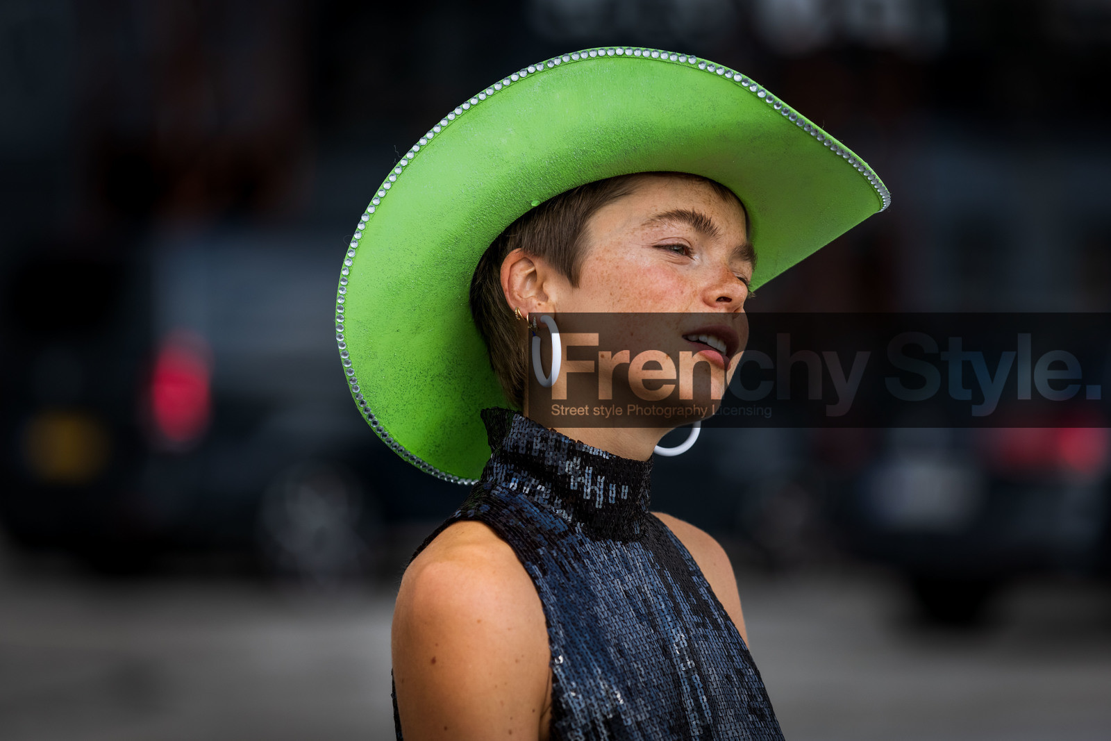 Emma Fridsell, green hat, cowboy hat, strassed hat, white earrings, multi earrings, hoop earrings, freckles, black dress, sequins dress, high collar dress, sleeveless dress, close up detail, fashion week, frenchystyle, FW, jonathan paciullo, street style, SPRING SUMMER 2022, SS 22, COPENHAGEN, CPHFW, atmosphere details, horizontal
