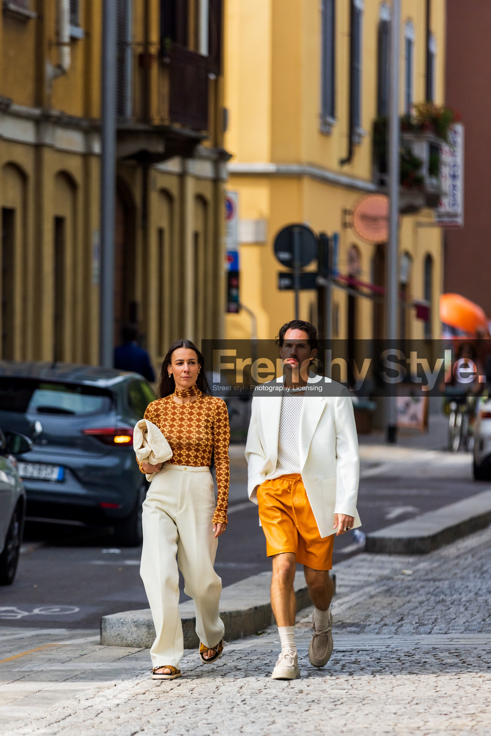 Alice Barbier, beige moccassins, beige shoes, color, couple, cream bag, cream pants, duo, Jean-Sebastien Roques, knit, menswear, mesh top, moccasins, orange short, orange turtleneck, pants, printed turtleneck, sandals, short, turtleneck, white bag, white blazer, white knit, white pants, white top, fashion week, frenchystyle, FW, jonathan paciullo, street style, SPRING SUMMER 2022, SS 22, MFW, MILAN, vertical, full length