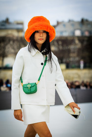 orange hat, fluffy hat, furry hat, dior, mini dior bag, green bag, white look, mini skirt, buttoned jacket, yoyo cao, fashion week, frenchystyle, FW, jonathan paciullo, street style, AUTUMN WINTER 2022-2023, FALL WINTER 2022_2023, FW 22-23, PFW, PARIS, vertical, detail