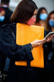 black trench coat, black suede bag, black polish bag, roger vivier bag, shoulder bag, orange clutch, polish clutch, close up detail, bag detail, covid face mask, fashion week, frenchystyle, FW, jonathan paciullo, street style, PFW, PARIS, SPRING SUMMER 2021, SS 21, vertical, atmosphere details, detail