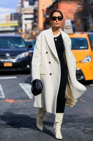 geraldine boublil, white coat, white leather boots, black dress, knitwear, knit dress, black leather clutch, plaited clutch, long dress, high boots, golden earrings, hoop earrings, bottega veneta bag, sharp end boots, fashion week, frenchystyle, FW, jonathan paciullo, street style, FALL WINTER 2020-2021, AUTUMN WINTER 2020-2021, FW 20-21, vertical, full length, NYFW, NEW YORK