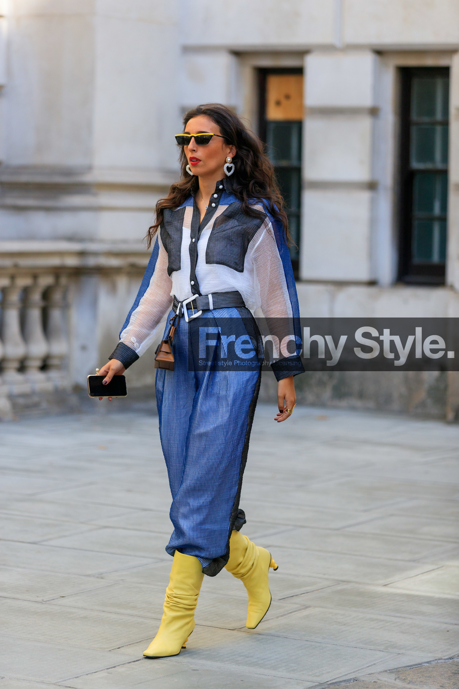 prada sunglasses, butterfly sunglasses, yellow sunglasses, black sunglasses, striped jumpsuit, blue jumpsuit, white jumpsuit, yellow leather boots, geometrical heel, silk jumpsuit, pearl earrings, heart shape earrings, fashion week, frenchystyle, FW, jonathan paciullo, street style, vertical, full length