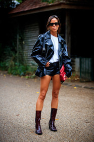 nina urgell cloquell, black leather perfecto, black leather shorts, red leather clutch, white t-shirt, oversize perfecto, mini shorts, burgundy leather boots, animal skin boots, chelsea boots, loewe clutch, black sunglasses, square shape glasses, fashion week, frenchystyle, FW, jonathan paciullo, street style, PFW, PARIS, SPRING SUMMER 2021, SS 21, vertical, full length