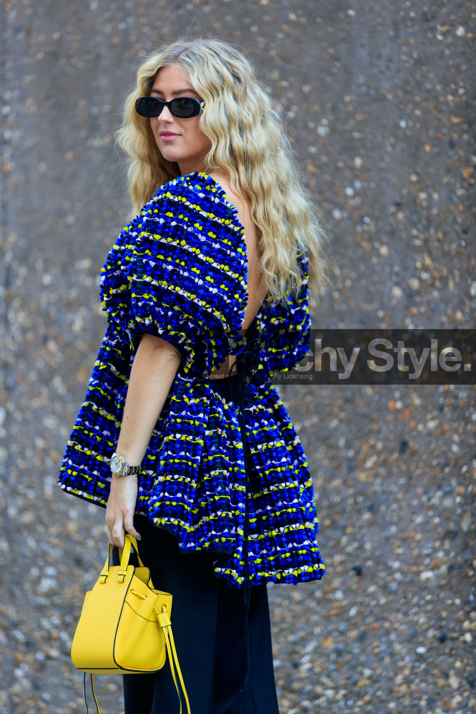 emili sindlev, gucci sunglasses, black sunglasses, knit top, multicolor top, loewe bag, mini bag, hand bag, yellow leather bag, black pants, rolex watch, silvered and golden watch, fashion week, frenchystyle, FW, jonathan paciullo, street style, vertical, detail, atmosphere details