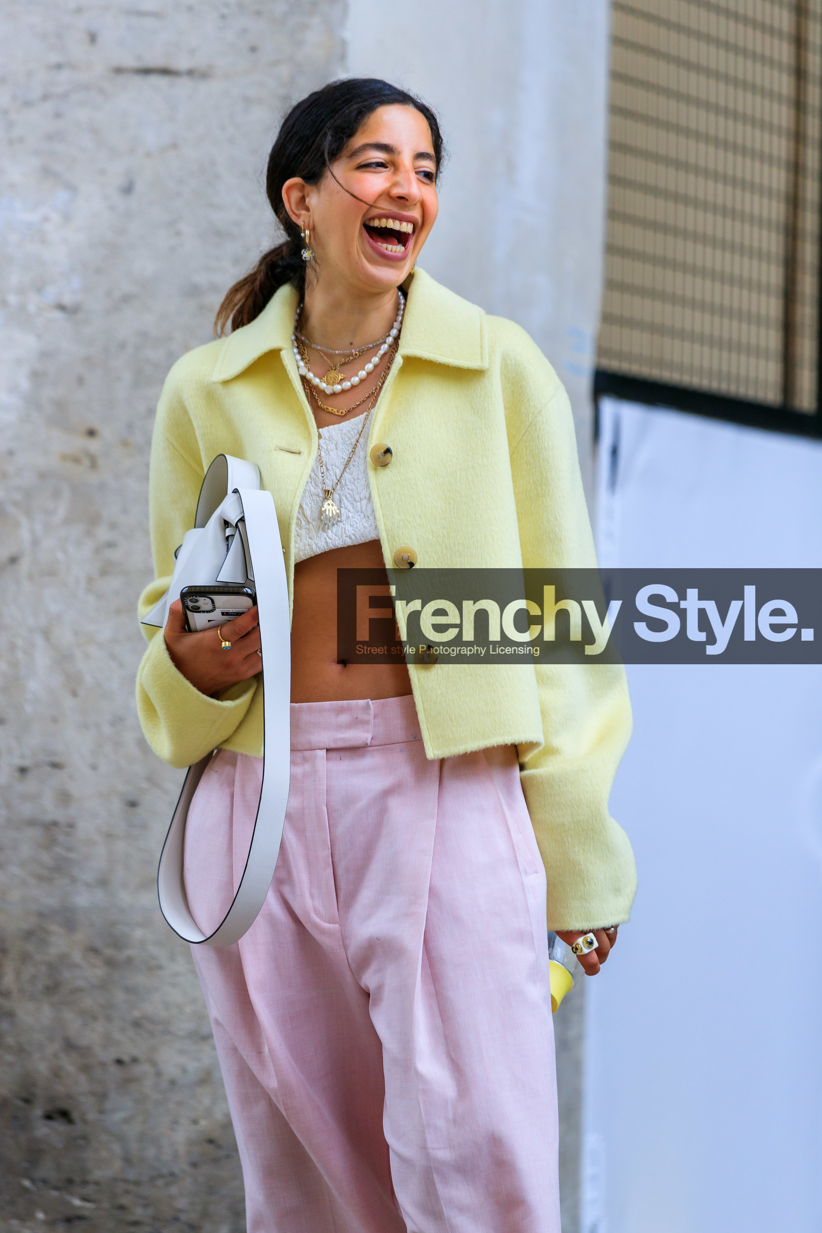 light yellow jacket, yellow jacket, white top, asymmetrical top, cropped top, light pink pants, pink pants, oversize pants, carrot pants, low waist pants, golden necklace, golden earrings, multi necklace, multi earrings, medal necklace, pearl necklace, white leather bag, acne studios bag, selma kaci, fashion week, frenchystyle, FW, jonathan paciullo, street style, PFW, PARIS, SPRING SUMMER 2022, SS 22, vertical, atmosphere details, detail