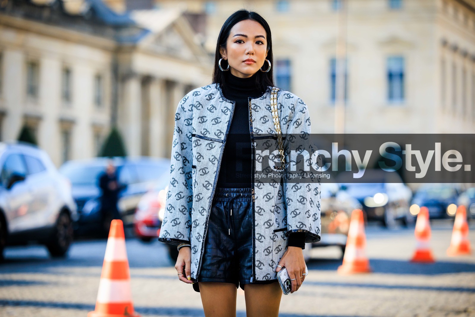 black top, black turtleneck, silver loops, chanel jacket, logo jacket, grey chanel jacket, black shorts, leather shorts, close up, yoyo cao, street style, jonathan paciullo, FW, frenchystyle, fashion week, AUTUMN WINTER 2022-2023, FALL WINTER 2022_2023, FW 22-23, horizontal, PFW, PARIS, atmosphere details, detail