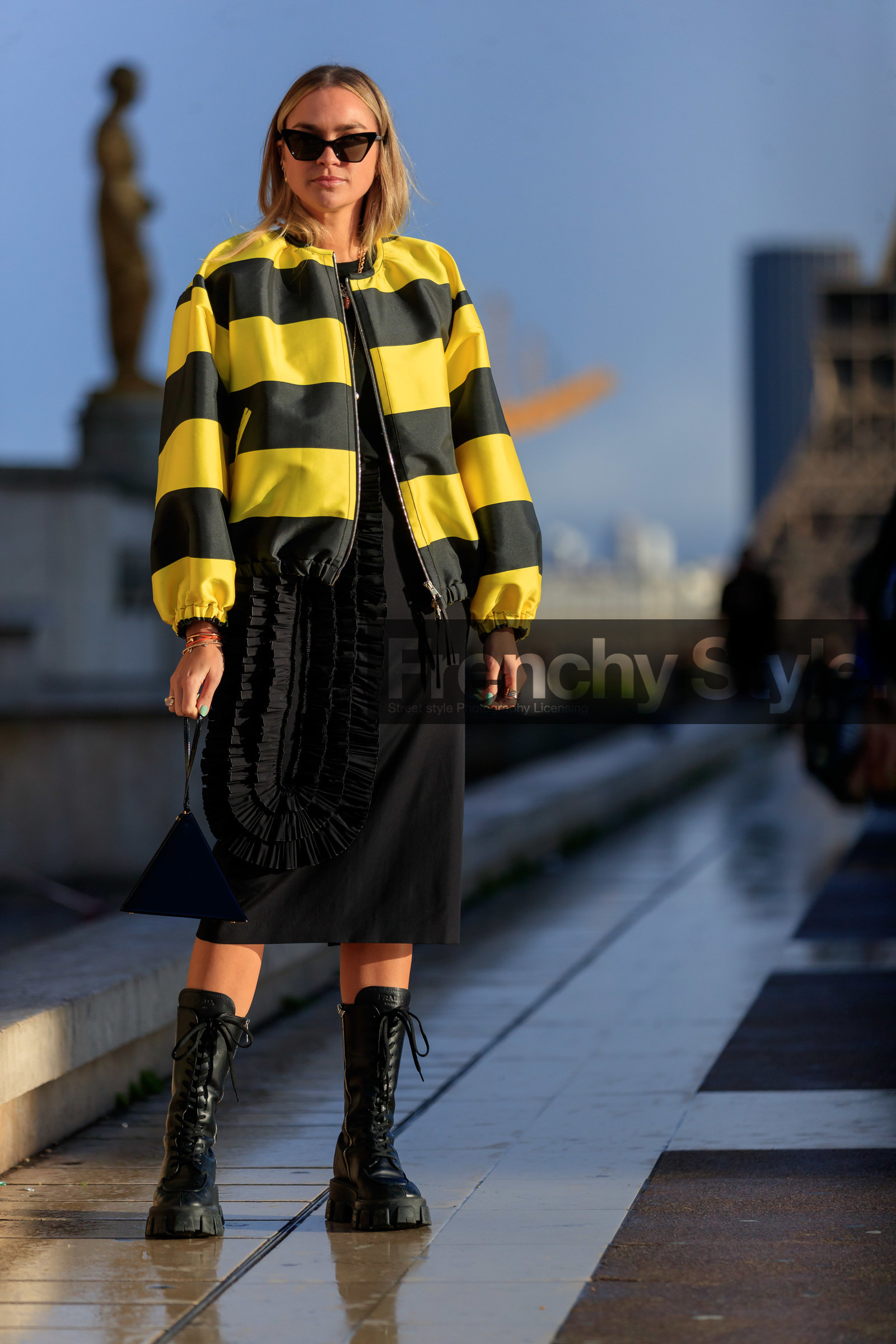 nina suess, yellow jacket, yellow bombers, black jacket, black bombers, black skirt, mid long skirt, ruffle skirt, dries van noten skirt, black sunglasses, black leather bag, black leather boots, laced boots, prada boots, flat boots, big sole boots, geometric shape bag, hand bag, butterfly sunglasses, striped bombers, striped jacket, zipped jacket, fashion week, frenchystyle, FW, jonathan paciullo, street style, PFW, PARIS, AUTUMN WINTER 2020-2021, FALL WINTER 2020-2021, FW 20-21, vertical, full length