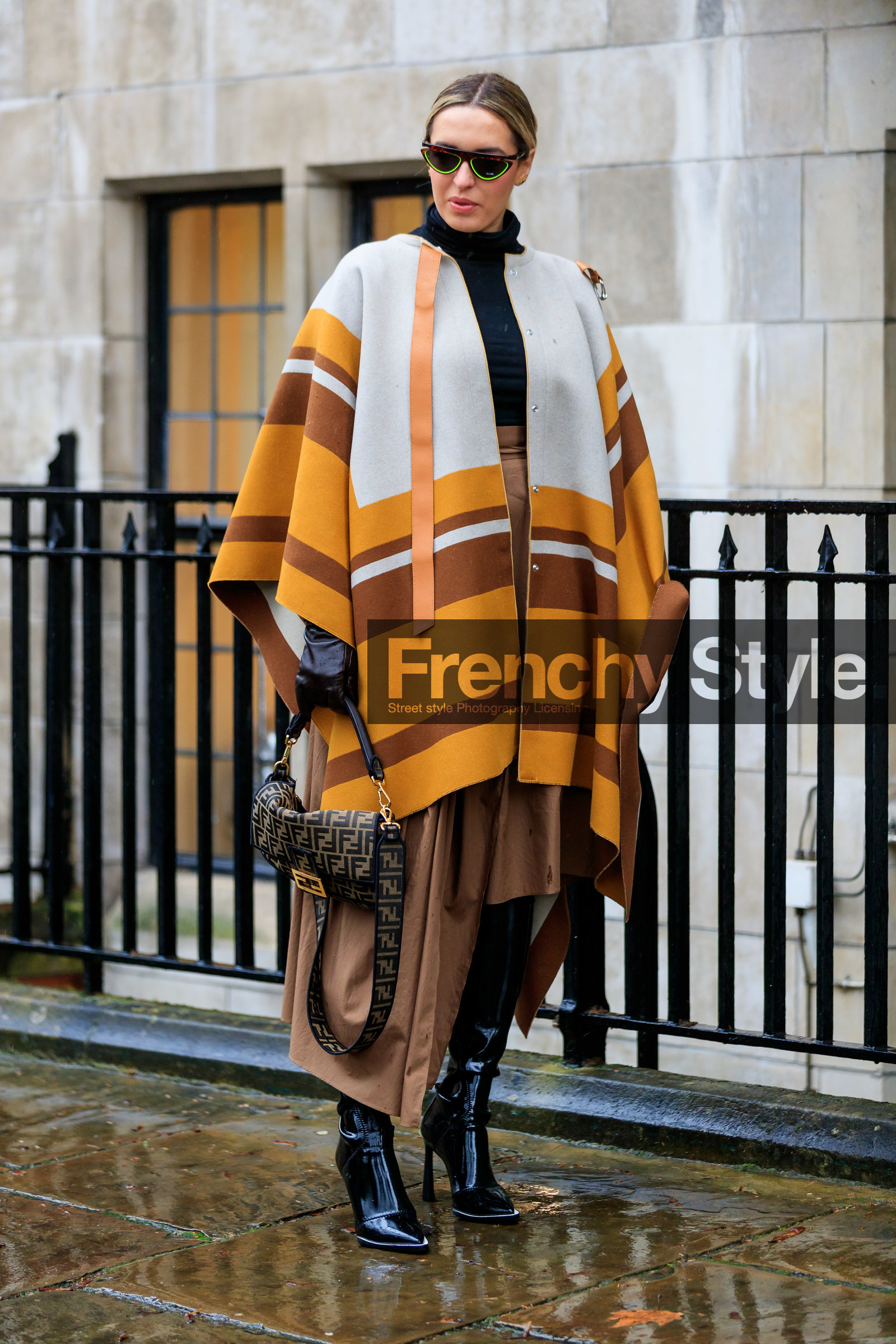 striped cape, yellow cape, camel cape, white cape, neon yellow sunglasses, scale sunglasses, futurist shape sunglasses, brown skirt, asymetrical skirt, silk skirt, long skirt, black polish boots, high boots, high heels boots, monogrammed bag, black leather gloves, hand bag, brown bag, fendi bag, fashion week, frenchystyle, FW, jonathan paciullo, street style, LFW, LONDON, AUTUMN WINTER 2020-2021, FALL WINTER 2020-2021, FW 20-21, vertical, full length