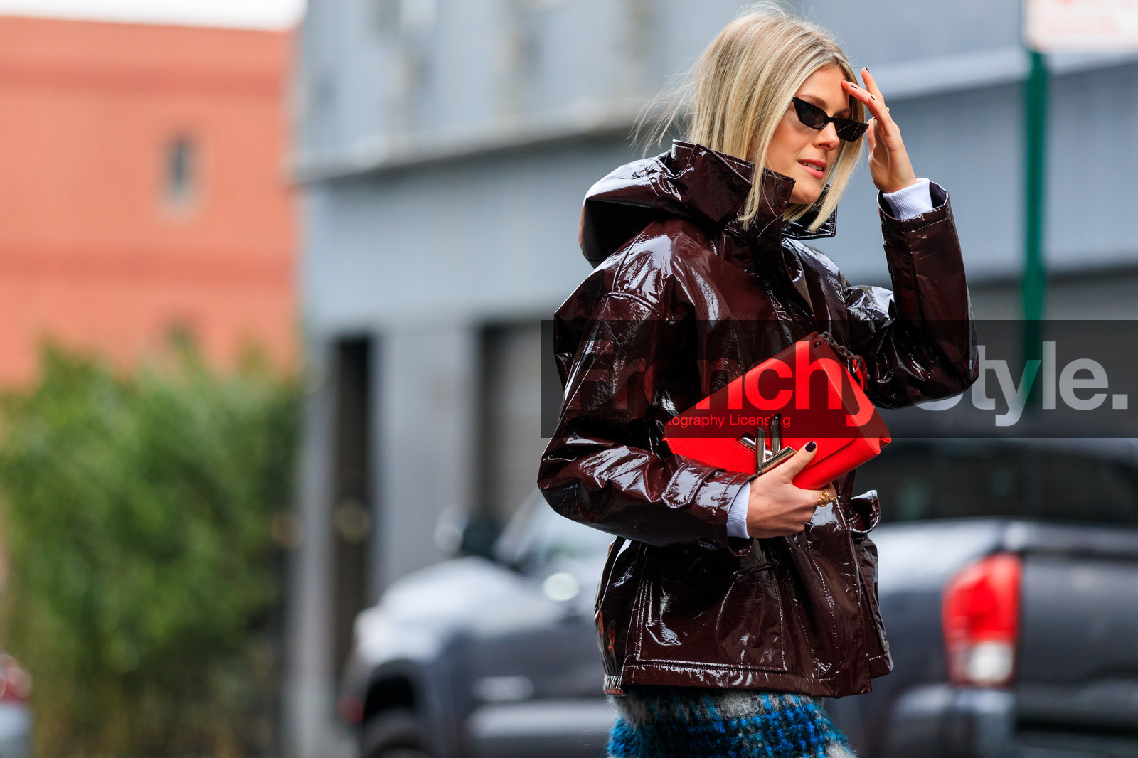 brown jacket, graphic skirt, hood, leather bag, leather jacket, louis vuitton, printed skirt, rain coat, red bag, sunglasses, vinyl, street style, jonathan paciullo, FW, frenchystyle, fashion week, NYFW, NEW YORK, AUTUMN WINTER 2018-2019, AW 18-19, FALL WINTER 2018-2019, FW 18-19, atmosphere details, horizontal, detail, sofie valkiers