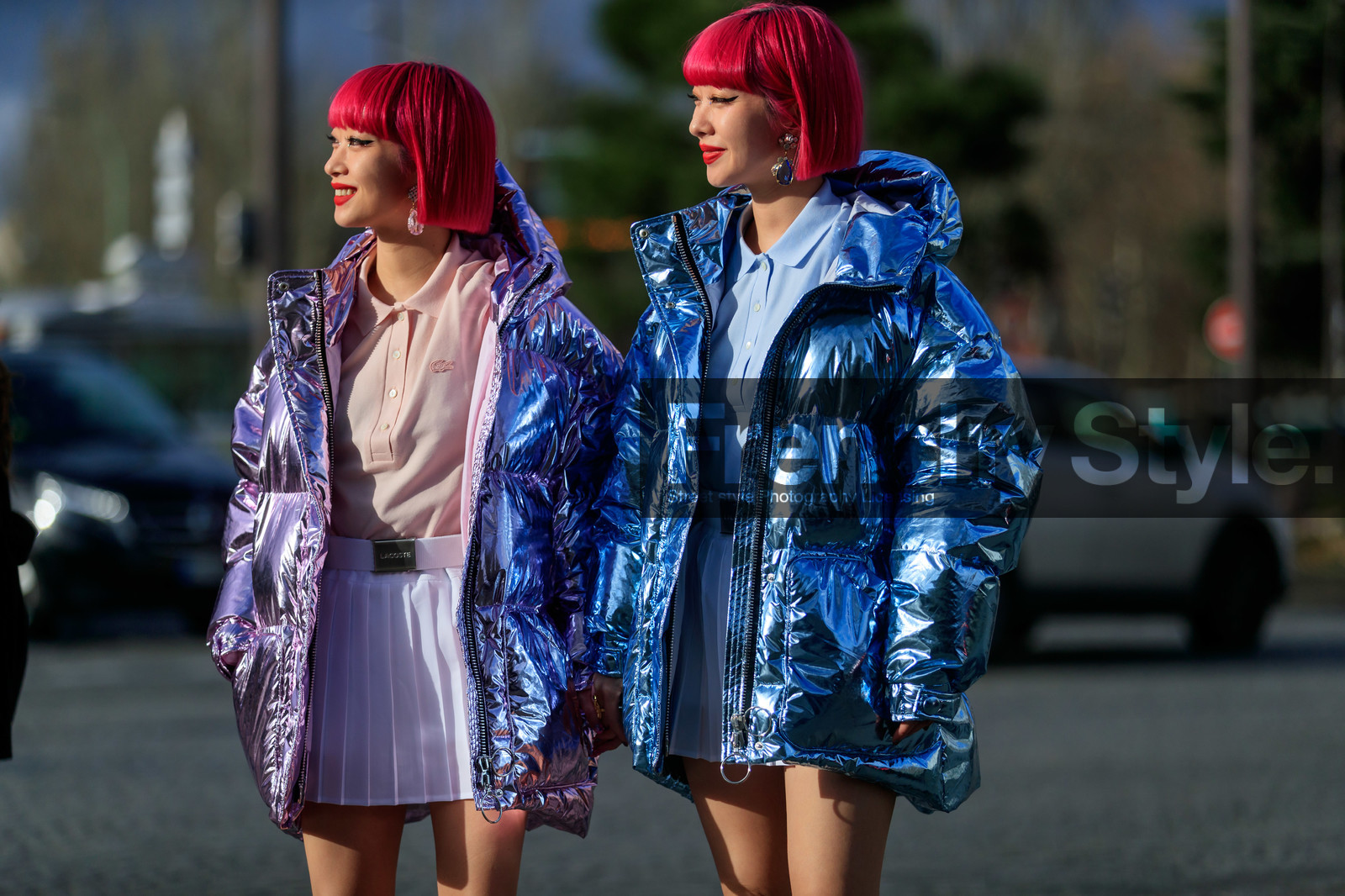 Ami and Aya Suzuki, pink hair, light pink coat, light pink polo shirt, white skirt, mini skirt, pleated skirt, white belt, light blue polo shirt, light blue socks, blue coat, down jacket, metalic coat, lurex coat, strassed earrings, dangling earrings, pink earrings, blue earrings, lacoste polo shirt, lacoste skirt, lacoste belt, fashion week, frenchystyle, FW, jonathan paciullo, street style, PFW, PARIS, horizontal, atmosphere details, detail