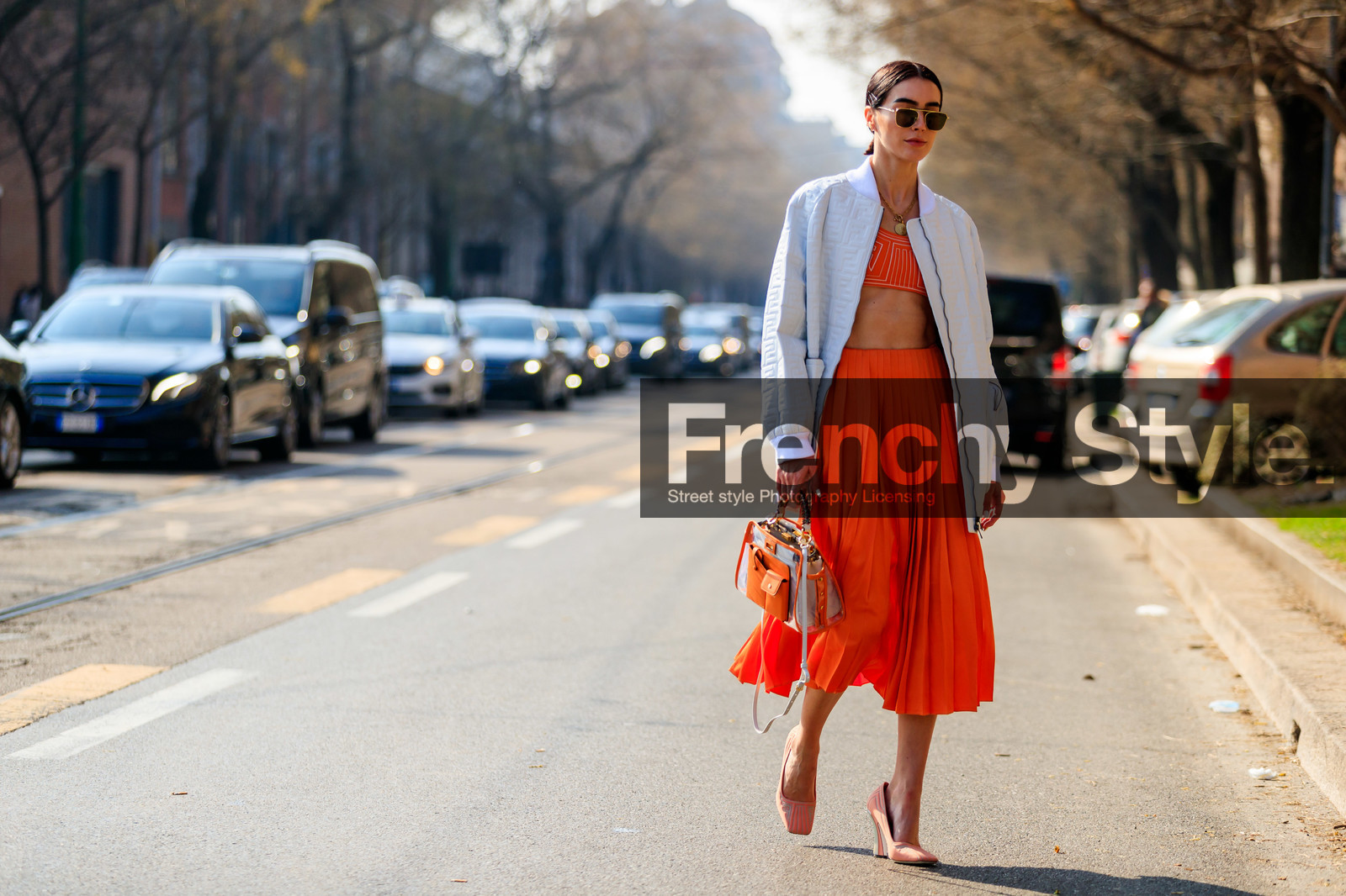 bomber jacket, brittany xavier, crop top, fendi, graphic bag, high heels, leather bag, leather jacket, leather shoes, monogram, orange bag, pink shoes, pleats, printed bag, red skirt, red top, sunglasses, white jacket, MILAN, MFW, fashion week, frenchystyle, FW, jonathan paciullo, street style, AUTUMN WINTER 2019-2020, AW 19-20, FALL WINTER 2019-2020, FW 19-20, atmosphere details, full length, horizontal