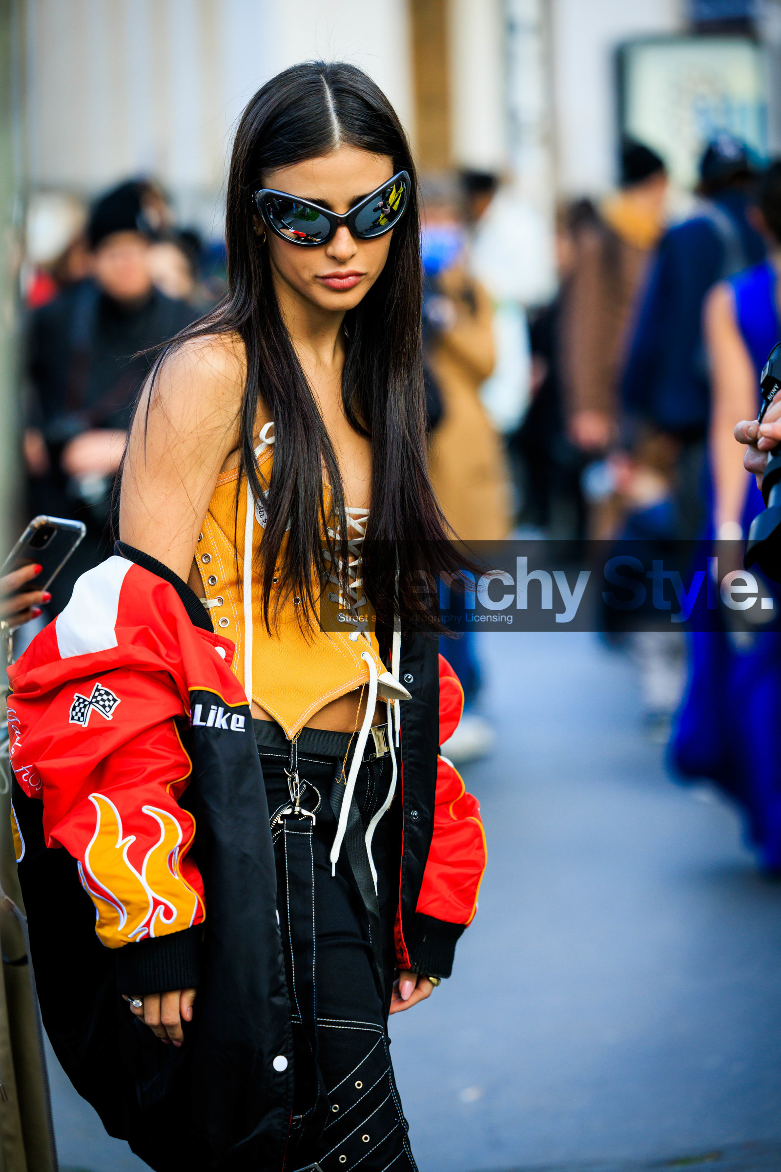 ufo sunglasses, black sunglasses, orange corset, corset top, black trousers, multicolor jacket, race jacket, red jacket, close up, street style, jonathan paciullo, FW, frenchystyle, fashion week, AUTUMN WINTER 2022-2023, FALL WINTER 2022_2023, FW 22-23, PARIS, PFW, vertical, detail