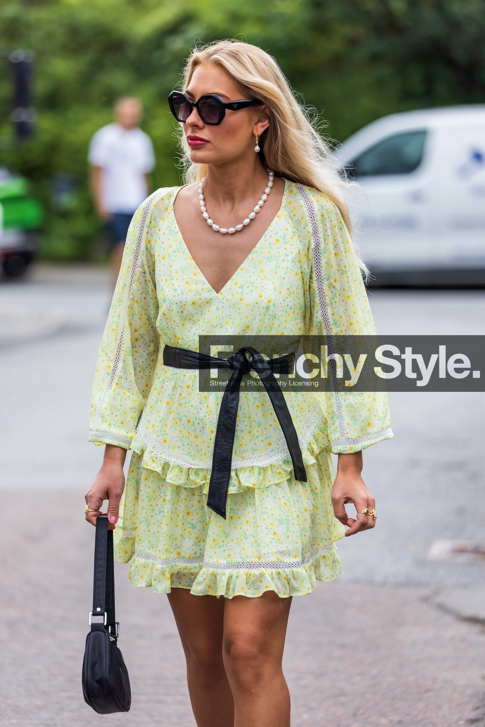 bag, belted top, black bag, black sunglasses, floral skirt, floral top, flower, flower print, green top, pearl earrings, pearl neckalce, print, printed skirt, printed top, ruffles, short skirt, skirt, sunglasses, top, yellow skirt, yellow top, Maria Wos, fashion week, frenchystyle, FW, jonathan paciullo, street style, SPRING SUMMER 2022, SS 22, COPENHAGEN, CPHFW, vertical, atmosphere details