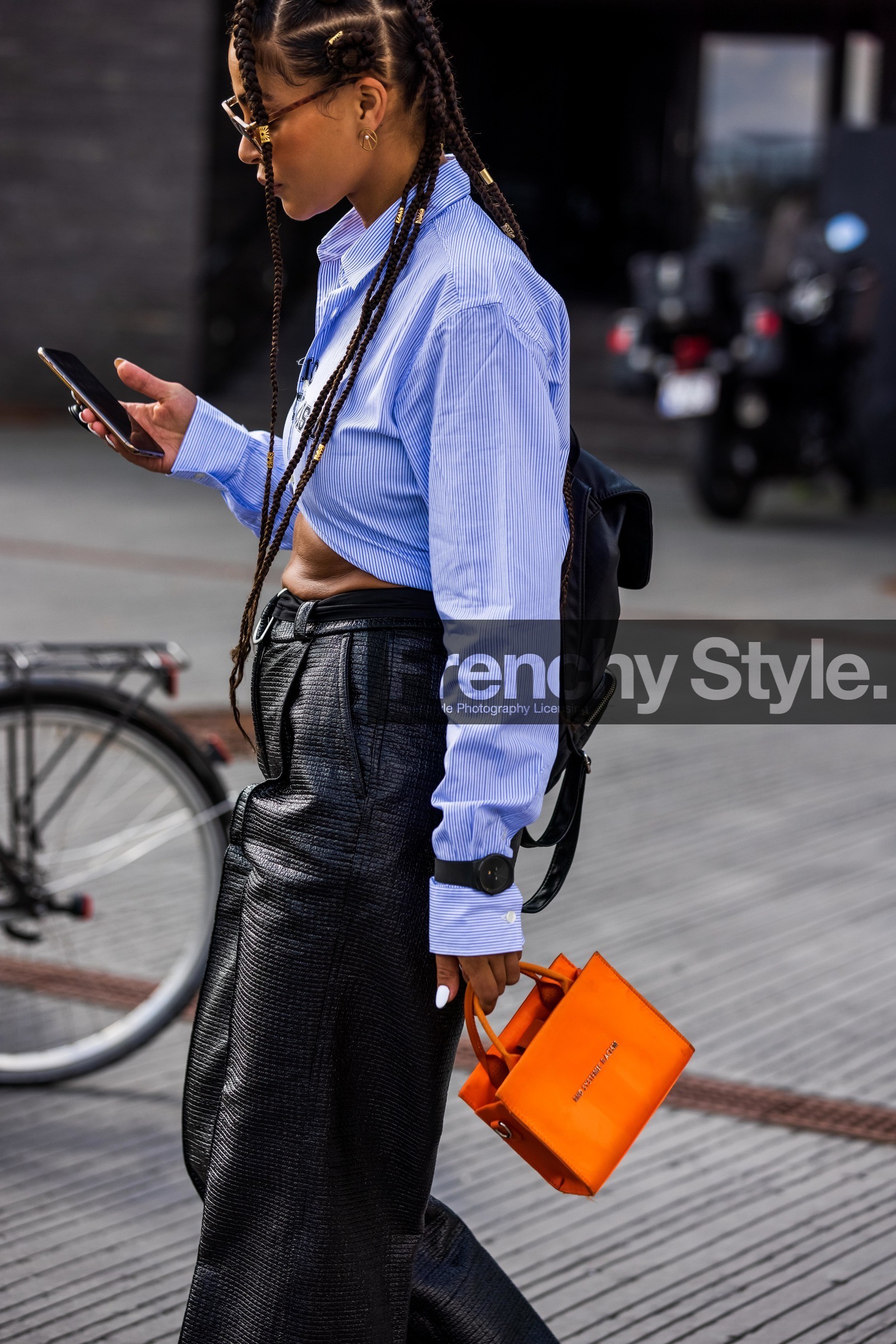 blue shirt, white shirt, striped shirt, cropped shirt, black polish pants, animal skin pants, vinyl pants, loose pants, mini bag, orange bag, orange leather bag, plaited hair, hair details, haircut, fashion week, frenchystyle, FW, jonathan paciullo, street style, SPRING SUMMER 2022, SS 22, COPENHAGEN, CPHFW, vertical, atmosphere details