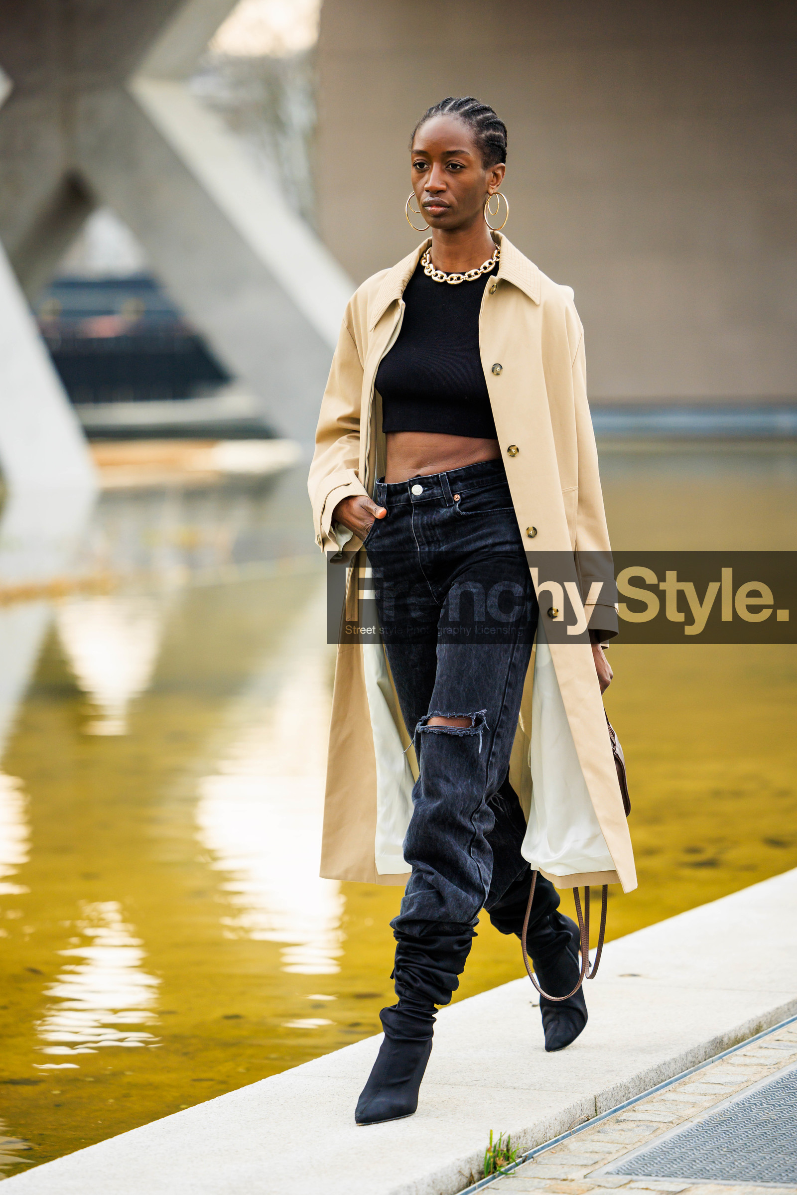 big loop earrings, black cropped top, beige trench, buttoned trench coat, ripped jeans, golden chain choker, braids, black boots, slouch boots, sasha payton, street style, jonathan paciullo, FW, frenchystyle, fashion week, MFW, MILAN, FALL WINTER 2022_2023, AUTUMN WINTER 2022-2023, FW 22-23, vertical, full length, model