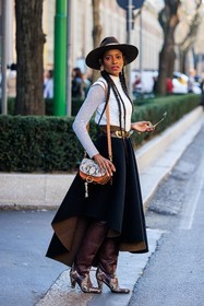 cowboy hat, white top, crossbody bag, animal print bag, cowboy look, serpent boots, animal print boots, leather boots, black midi skirt, buckled belt, dual toned skirt, pleated skirt, long braids, fashion week, frenchystyle, FW, jonathan paciullo, street style, MFW, MILAN, FALL WINTER 2022_2023, AUTUMN WINTER 2022-2023, FW 22-23, vertical, full length